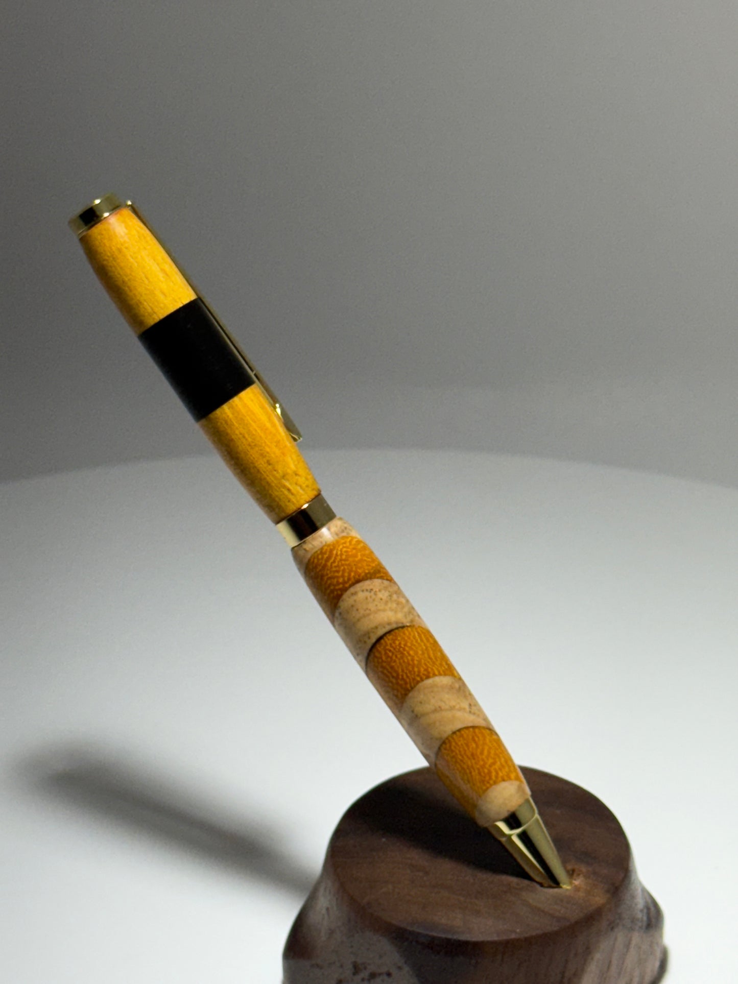 Hickory/Arg. Osage Orange/Ebony slimline style twist pen W/Brass trim