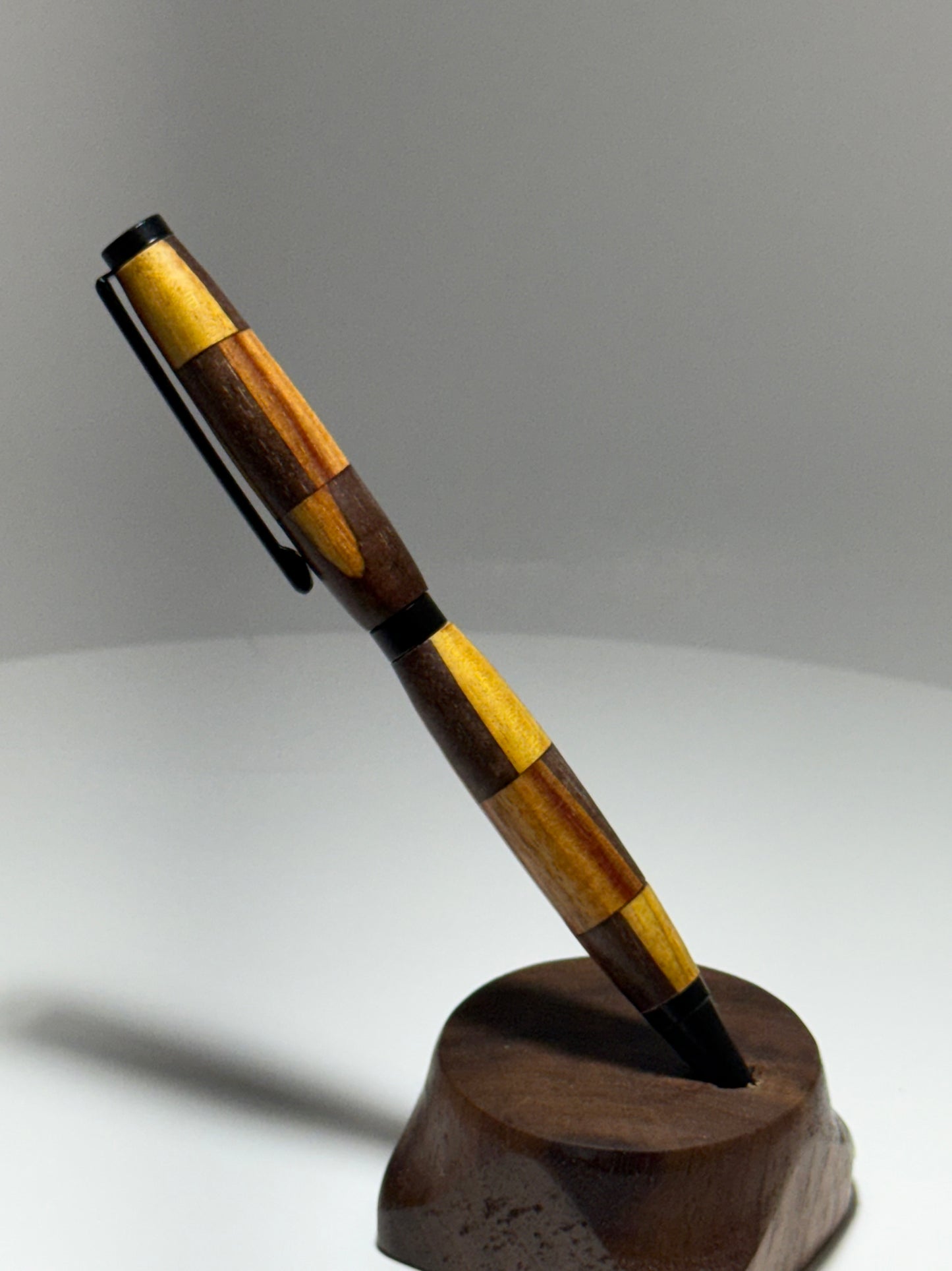 Black walnut/ Canarywood slimline style twist pen W/black trim