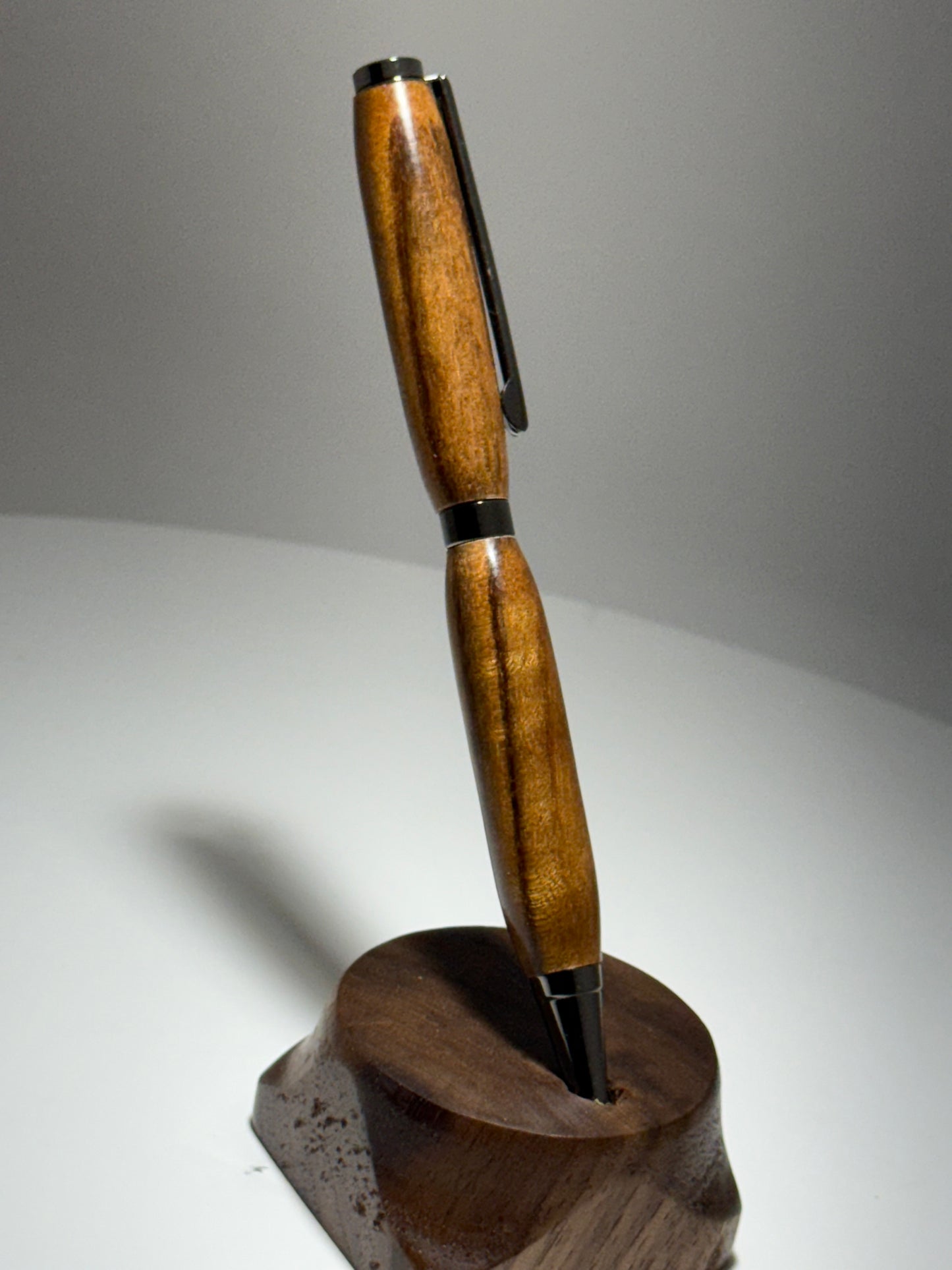 Curly Shedua slimline style twist pen W/Gunstock trim